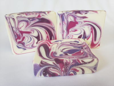 Black Cherry Handmade Soap - A fabulous smelling soap with just the right mix of cherry, almond, and orange with a touch of cimmanom to add depth.  Ingredients:  Olive oil, coconut oil, organic palm oil, water, sodium hydroxide, shea butter, sweet almond oil, meadowfoam oil, caster oil, fragrance, kaolin clay, skin-safe colorants